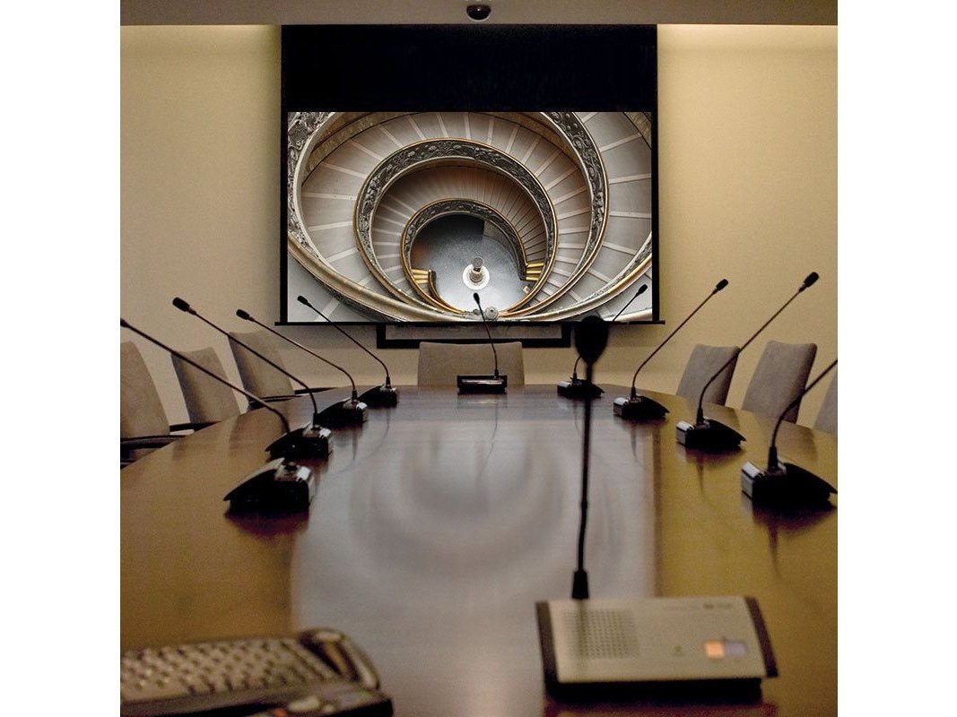 Draper Access E projection screen installed in a conference room