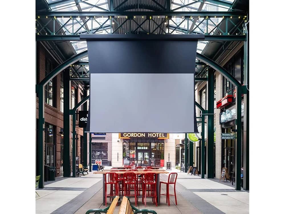 Draper Acumen XL V projection screen installed in an atrium